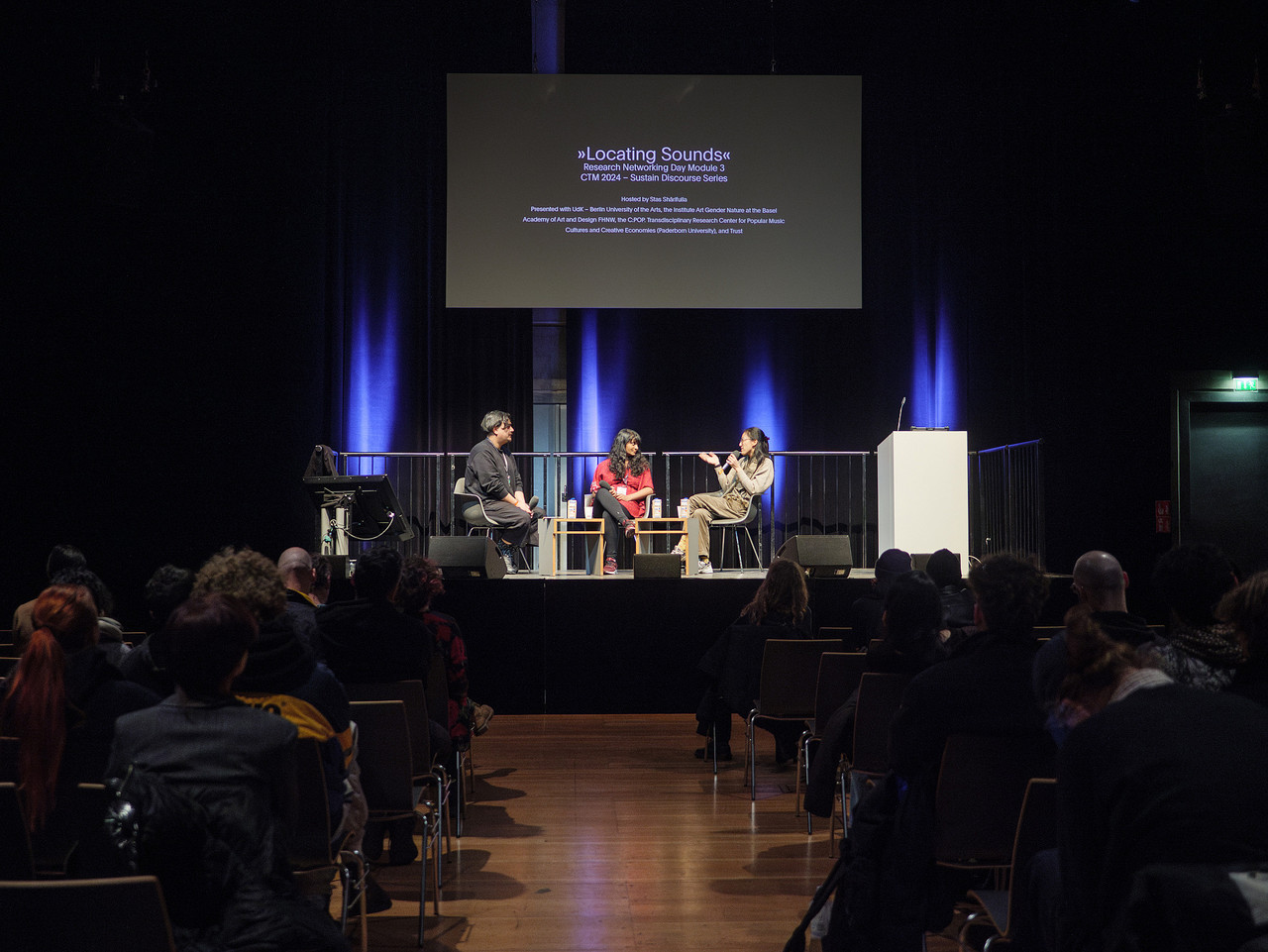 Aadita Chaudhury and Julianne Chua discuss their research with Stas Shärifulla following their presentations at RND 2024, radialsystem.